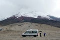 Van in a lot below the glacier on Cotopaxi Volcano