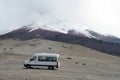 Van in a lot below the glacier on Cotopaxi Volcano