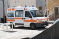 Van for medical assistance with the text AMBULANZA that meaning ambulance in Italian language