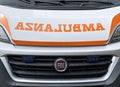 Van for medical assistance with the text AMBULANZA that meaning ambulance in Italian language