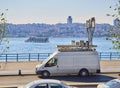 A van with mobile communications network antennas.