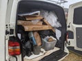 A van packed full of rubbish from a house clearance