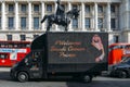 Van passes Whitehall with a sign welcoming the Saudi Crown Prince of Saudi Arabia, Mohammad bin Salman to the UK