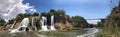 Van Province, Turkey -07 21 2021; Muradiye waterfall, open-air trees and exuberant waterfall view. people pass the time.