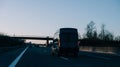 Van silhouette driving at dusk on European highway German autoba