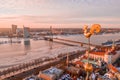 VanÃÂ¡u Bridge on the Daugava river gleaming under the cloudy sky in Riga, Latvia