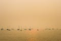 Vancouver, BC - August 22, 2018: Boats moored in haze of forest fire smoke.