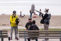 VANCOUVER, BC, CANADA - APR 26, 2020: Members of the press interview protesters in an anti lockdown march.