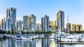 Skyscapers lining the skyline of Yaletown with Quayside Marina along False Creek Inlet of Vancouver, British Columbia, Canada