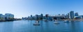 Vancouver marina, False Creek, modern buildings skyline in the background. BC, Canada.