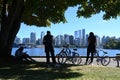 Vancouver, BC, Canada - August 16, 2023: A people on Stanley Park with downtown of the Vancouver at the background Royalty Free Stock Photo