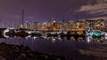 A night long exposure photo of many yachts and boats docked inside a marinamarina Royalty Free Stock Photo