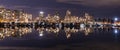 A night long exposure photo of marina inside Burrard Inlet of Vancouver Harbor with many boats Royalty Free Stock Photo