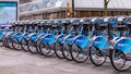 A row of bicycles at Mobi bike-share station