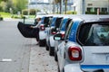 VANCOUVER, BC, CANADA - SEPT 21, 2019: A row of Car2Go SmartCars in Vancouver`s Olympic Village which make up part of