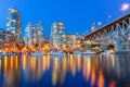 Vancouver BC skyscrapers and Granville Bridge reflection along False Creek at blue hour Royalty Free Stock Photo