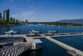 Vancouver, British Colambia - 16.08.2021 - Downtown water plane airport. Three hydroplanes staying in water.