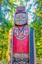 Totem pole exhibit showcasing monumental carvings indigenous to the western Royalty Free Stock Photo