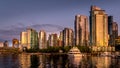 Sunset over the High Rise Buildings along the shore of Coal Harbor, Vancouver Royalty Free Stock Photo