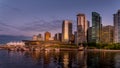 Sunset over the High Rise Buildings, Float Plane Terminal and Cruise Ship Terminal along the shore of Coal Harbor, Vancouver