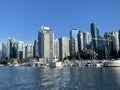 A view of the downtown Vancouver waterfront in Coal Harbour full of giant skyscrapers Royalty Free Stock Photo