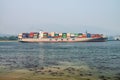 VANCOUVER, CANADA - AUGUST 8, 2017: Cosco cargo ship enters the city, approaching Vancouvert Port