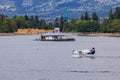 De Havilland Beaver sea plane passing the fueling station in the Royalty Free Stock Photo