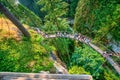 Vancouver, Canada - August 11, 2017: People at Capilano Bridge. It is a Suspension bridge crossing the Capilano River, 140 metres Royalty Free Stock Photo