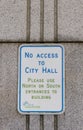 View of notice sign `No Access to City Hall` on a Grey wall of Vancouver City Hall Building