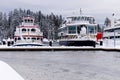 A View of frozen dock with boats in Coal Harbour. Vancouver authentic paddle wheeler `Constitution`