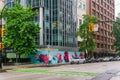 VANCOUVER, CANADA - JUNE 10, 2020: street in downtown Vancouver in rainy day with buildings and cars