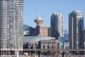 The Vancouver Lookout building and Rogers Arena with mountains in the background Royalty Free Stock Photo