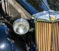 VANCOUVER, CANADA - MAY 15, 2020: Close-up of the front part of black vintage car Headlights and details Royalty Free Stock Photo