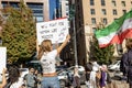 Huge rally in support of Iranian protests in front of Vancouver Art Gallery. Woman with a sign We will fight for women life Royalty Free Stock Photo