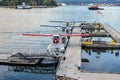 Seaplanes/Float Planes/ Pontoon Planes docked in Coal Harbour, downtown Vancouver, British Columbia