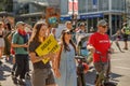 Young activists with signs walking down Cambie Street as part of the Global Climate Strike in Vancouver