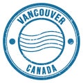 VANCOUVER - CANADA, words written on blue postal stamp Royalty Free Stock Photo