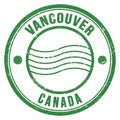 VANCOUVER - CANADA, words written on green postal stamp Royalty Free Stock Photo