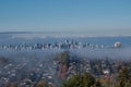 Vancouver city partially covered by fog in the winter morning time. BC Canada Royalty Free Stock Photo