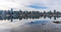 Vancouver City skyline reflected on the water surface. Beautiful cityscape seen from Stanley Park. Royalty Free Stock Photo