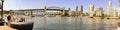 Vancouver False Creek panorama at sunset with bridge and boat.