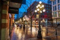 Vancouver Gastown Steam Clock and beautiful street view on a rainy night. Royalty Free Stock Photo