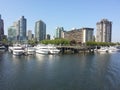 Vancouver harbor with skyline, yachts and boats.