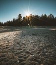 Vancouver Island beach view on a clear blue sky with sunstar and pacific coast. Canada. Royalty Free Stock Photo