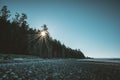Vancouver Island beach view on a clear blue sky with sunstar and pacific coast. Canada. Royalty Free Stock Photo