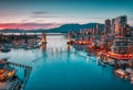 VANCOUVER - MAY 05 2019: Downtown Vancouver Canada. Scenic view at Burrard Bridge from Granville Island, Vancouver Royalty Free Stock Photo