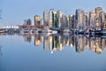 Vancouver Skyline and reflection in calm water. Royalty Free Stock Photo