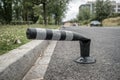 Vandalised Black Bollard with reflectors