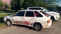 Vandalism - a modern car, doused with paint in free parking