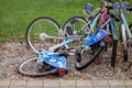 Vandalism. Nextbike bike-sharing bicycles thrown on the ground instead of being put into the stand